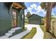 Home exterior featuring matching house and garage with a concrete driveway and lush greenery at 101 E Lambright St, Tampa, FL 33604