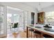 Bright kitchen view into study and pantry with an island and counter seating at 101 E Lambright St, Tampa, FL 33604