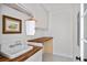 Functional laundry room features butcher block countertops, ample cabinet storage and shiplap walls at 101 E Lambright St, Tampa, FL 33604
