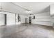 Large garage with ample space for storage and potential workshop area at 10237 Carrin Rd, Spring Hill, FL 34608