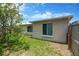 Exterior view of home with fenced backyard at 11896 104Th Ln, Largo, FL 33773