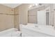 Bathroom with white vanity and tiled shower at 11896 104Th Ln, Largo, FL 33773