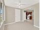 Bright sun room with natural light flowing in, tile flooring, and views of the kitchen and backyard at 11896 104Th Ln, Largo, FL 33773