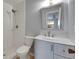 Updated bathroom features modern vanity and a fully tiled walk-in shower with rainfall shower head at 1214 Haddington Cir # 1214, Sun City Center, FL 33573