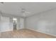 Bedroom features new floors, paint, and adjoining bathroom at 1214 Haddington Cir # 1214, Sun City Center, FL 33573