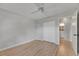 This neutral bedroom offers ample closet space and an ensuite bathroom at 1214 Haddington Cir # 1214, Sun City Center, FL 33573