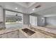 Bright kitchen featuring granite counters, modern sink, and an open view to the living area at 1214 Haddington Cir # 1214, Sun City Center, FL 33573