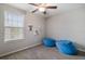 Cozy bedroom with large window and two beanbag chairs at 1218 Grantham Dr, Sarasota, FL 34234