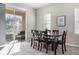 Bright dining room with sliding glass doors to the patio at 1218 Grantham Dr, Sarasota, FL 34234