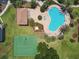 Community amenities featuring a basketball court, pool, and cabana from an aerial perspective at 12472 Country White Cir, Tampa, FL 33635