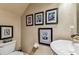 Stylish powder room showcasing artistic decor and contemporary fixtures at 12472 Country White Cir, Tampa, FL 33635