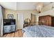 Inviting bedroom with a chandelier, wood floors, and plenty of storage at 12472 Country White Cir, Tampa, FL 33635