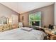 Bright bedroom with natural light and neutral decor, ideal for relaxation and rest at 12472 Country White Cir, Tampa, FL 33635