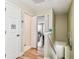 Hallway with hardwood flooring leading to bedrooms at 12472 Country White Cir, Tampa, FL 33635