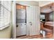 Convenient laundry area with a stacked washer and dryer unit, maximizing space at 12472 Country White Cir, Tampa, FL 33635