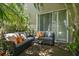 Cozy patio area with comfortable seating, ideal for outdoor relaxation and entertaining at 12472 Country White Cir, Tampa, FL 33635