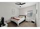 Cozy bedroom with natural light, ceiling fan, and comfortable decor for a restful space at 12643 Shetland Walk Dr, Lithia, FL 33547