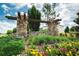 Attractive stone entrance sign to Hawkstone neighborhood with colorful landscaping at 12643 Shetland Walk Dr, Lithia, FL 33547