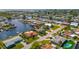An aerial view of a waterfront neighborhood in a desirable location and beautiful canal views at 12829 3Rd Isle, Hudson, FL 34667