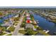 This canal-front home has an easy route to the Gulf and is located in a waterfront community at 12829 3Rd Isle, Hudson, FL 34667