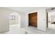 Open-concept living room showcasing natural light and charming design details at 12829 3Rd Isle, Hudson, FL 34667