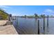 A deep water canal with wooden pylons are ready for your boats and other watercraft at 12829 3Rd Isle, Hudson, FL 34667
