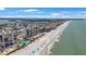 Aerial view showcasing the beachfront condo community along with picturesque beaches at 14950 Gulf Blvd # 902, Madeira Beach, FL 33708