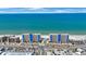 Aerial view of beachfront condo towers, showcasing their location and access to the shore at 14950 Gulf Blvd # 902, Madeira Beach, FL 33708