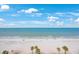 Expansive beach view with turquoise water and sandy shoreline, perfect for relaxation and recreation at 14950 Gulf Blvd # 902, Madeira Beach, FL 33708