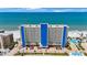 Oceanfront condo building featuring clean, modern architecture, beachfront access, and beautiful coastal views at 14950 Gulf Blvd # 902, Madeira Beach, FL 33708