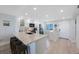 Modern kitchen with granite countertops, stainless steel appliances and ample bar seating at 14950 Gulf Blvd # 902, Madeira Beach, FL 33708