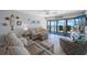 Comfortable living room showcasing ocean views, plush seating, and stylish décor at 14950 Gulf Blvd # 902, Madeira Beach, FL 33708