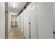 Hallway featuring a row of storage lockers and a support beam at 14950 Gulf Blvd # 902, Madeira Beach, FL 33708