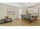 Cozy dining area with bench seating, a decorative light fixture, and easy access to other living areas at 15108 Winterwind Dr, Tampa, FL 33624