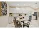 Well-equipped kitchen featuring a breakfast nook, tiled floors, and ample counter space at 15108 Winterwind Dr, Tampa, FL 33624
