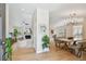 Bright living spaces feature tile flooring, a fireplace, and an open floor plan with dining area at 15108 Winterwind Dr, Tampa, FL 33624