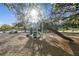 A fun playground with slides and other equipment for to enjoy in a wooded area at 15108 Winterwind Dr, Tampa, FL 33624