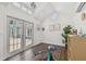 Well-lit shed interior offering wood floors, modern decor, and plenty of natural light at 15108 Winterwind Dr, Tampa, FL 33624