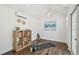 Shed interior with modern decor and wood flooring at 15108 Winterwind Dr, Tampa, FL 33624
