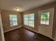 Bright dining room features beautiful wood floors, natural light and neutral colors at 159 6Th Nw St, Largo, FL 33770