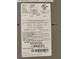 HVAC Label indicating refrigerant, voltage, and model number at 159 6Th Nw St, Largo, FL 33770