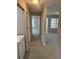 Hallway with carpet flooring leading to other rooms at 159 6Th Nw St, Largo, FL 33770