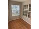 Sunroom with windows and unique tile flooring, perfect for relaxing at 159 6Th Nw St, Largo, FL 33770
