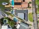 Overhead view of waterfront homes with private pools, docks, and boat access, emphasizing luxury living and outdoor amenities at 16106 6Th E St, Redington Beach, FL 33708