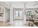Bright entryway with double doors, stylish flooring, and coastal-themed decor at 16106 6Th E St, Redington Beach, FL 33708
