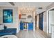 Living room features a custom bar area with a wine fridge and decorative accents at 16106 6Th E St, Redington Beach, FL 33708