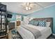 Main bedroom with an ensuite bath featuring a large comfortable bed, light-filled space, and stylish accents at 16106 6Th E St, Redington Beach, FL 33708