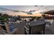 Enjoy waterfront views from this spacious balcony with outdoor seating at sunset at 16106 6Th E St, Redington Beach, FL 33708