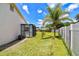 Features a view of the storage shed on the side of the house at 1910 Montego Ct, Oldsmar, FL 34677