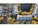 Townhome surrounded by lush greenery, near a tranquil pond, with street access and dedicated parking at 19232 Stone Hedge Dr, Tampa, FL 33647